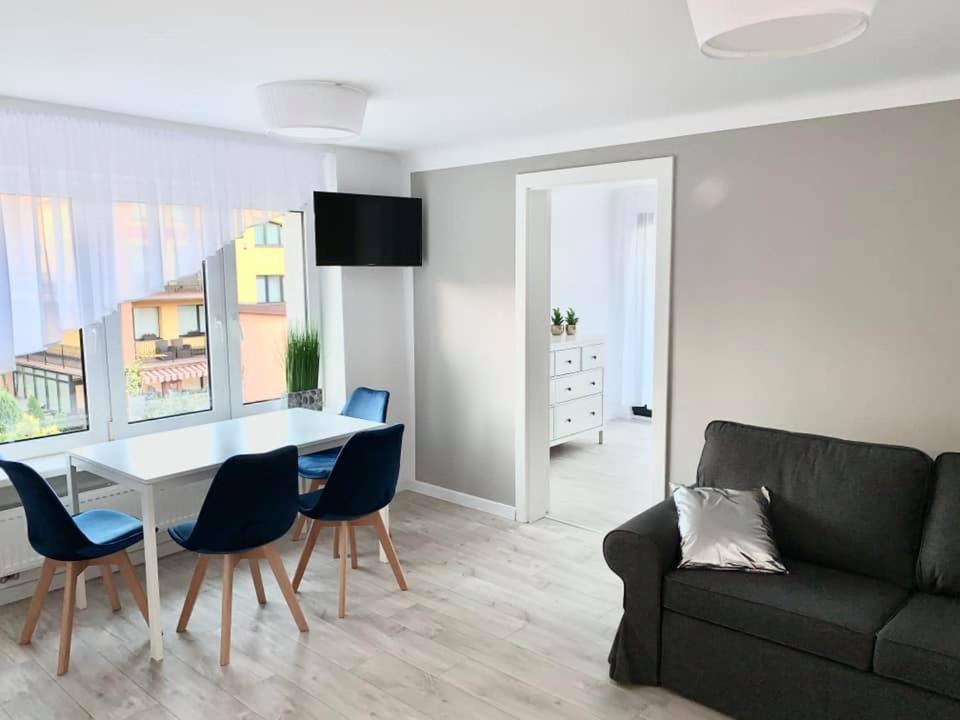 Televízia a/alebo spoločenská miestnosť v ubytovaní Casa del Sol Władysławowo