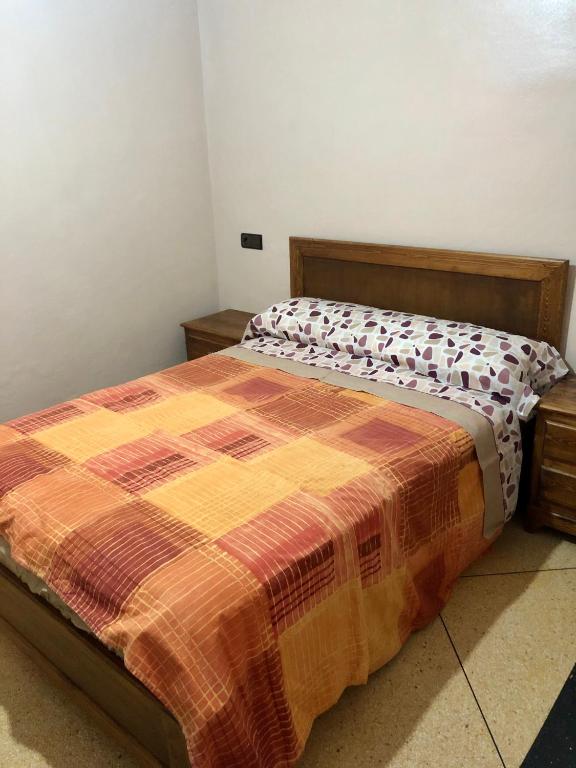 Postel nebo postele na pokoji v ubytování Hotel El Maghreb Al Kabir