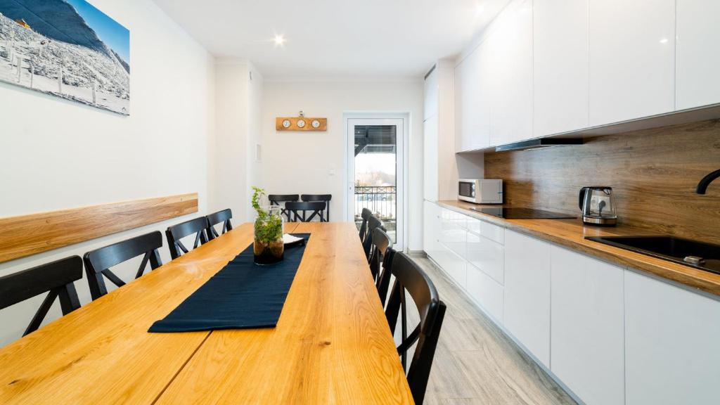 Kuchyňa alebo kuchynka v ubytovaní Apartamenty EverySky - Dom Orkana 9