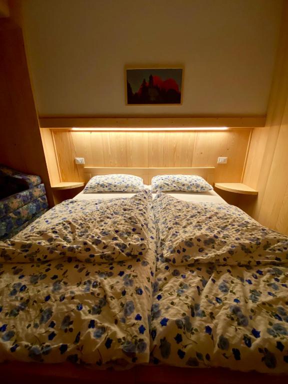 Postel nebo postele na pokoji v ubytování Garni al Barance