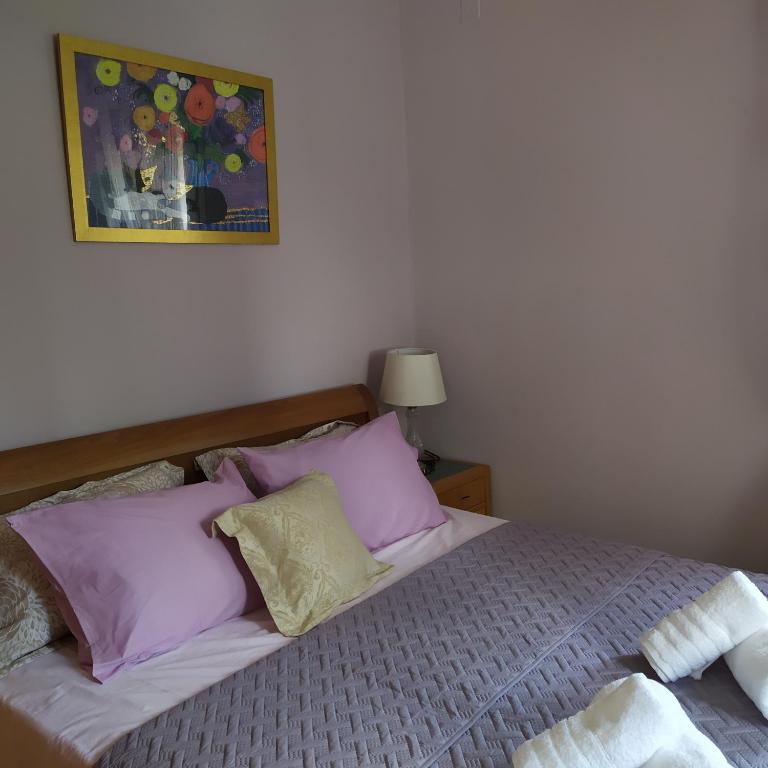 Postel nebo postele na pokoji v ubytování Napier Apartment