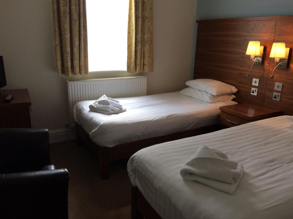 Postel nebo postele na pokoji v ubytování Wheatlands Lodge Hotel
