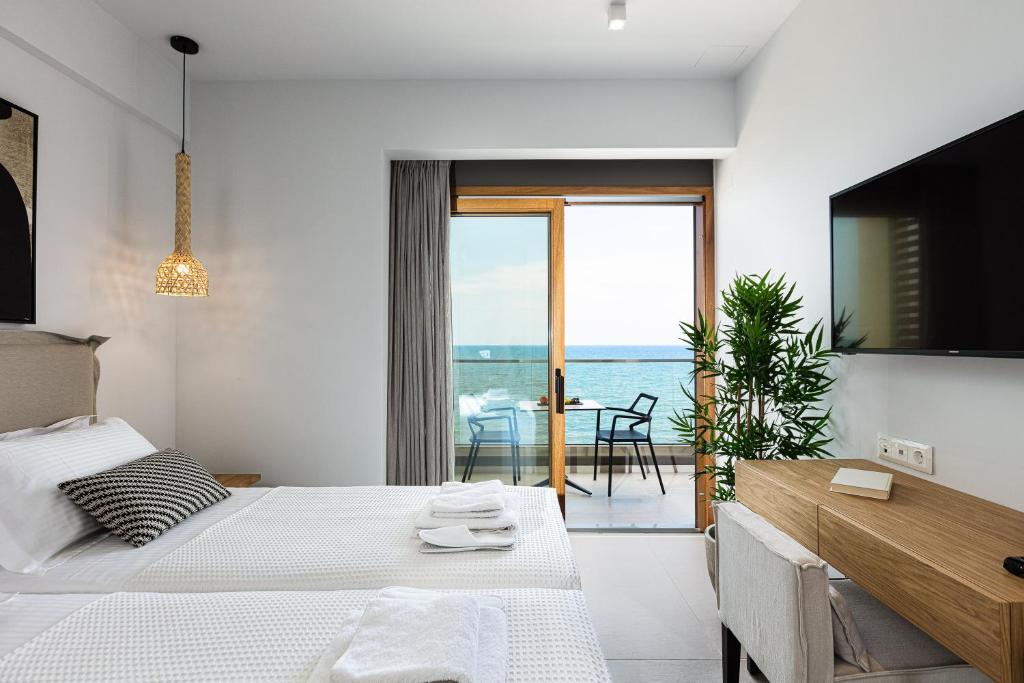Postel nebo postele na pokoji v ubytování North Coast Seaside Suites