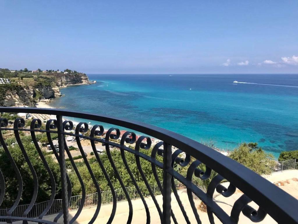 a view of the ocean from a balcony at Bonsai in Tropea