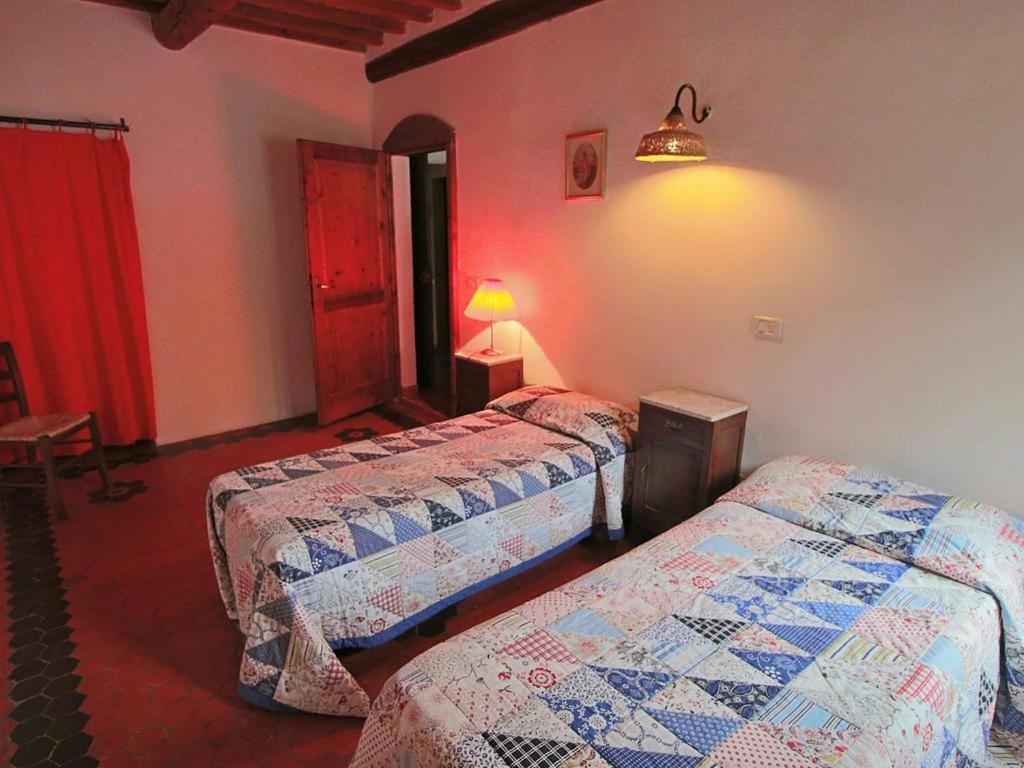 Postel nebo postele na pokoji v ubytování Agriturismo Le Vigne di Pace