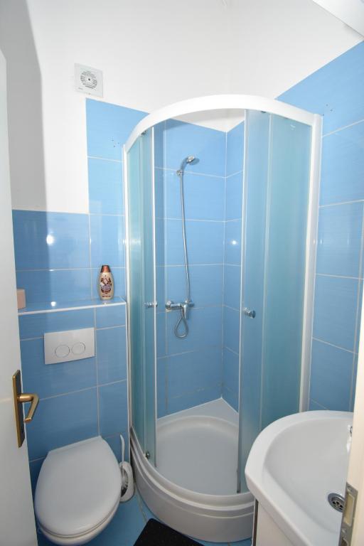 Ванная комната в Apartmani Rina