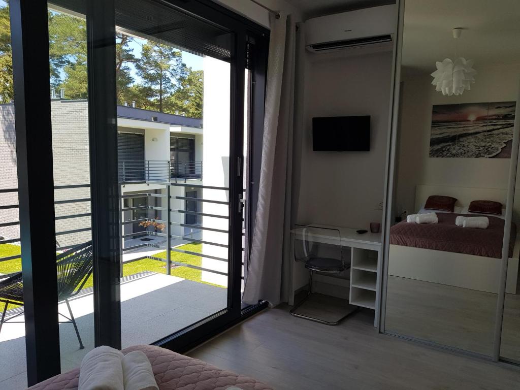 Posteľ alebo postele v izbe v ubytovaní Aprum Apartments 12C