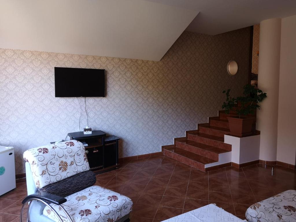TV a/nebo společenská místnost v ubytování Hotel Edem