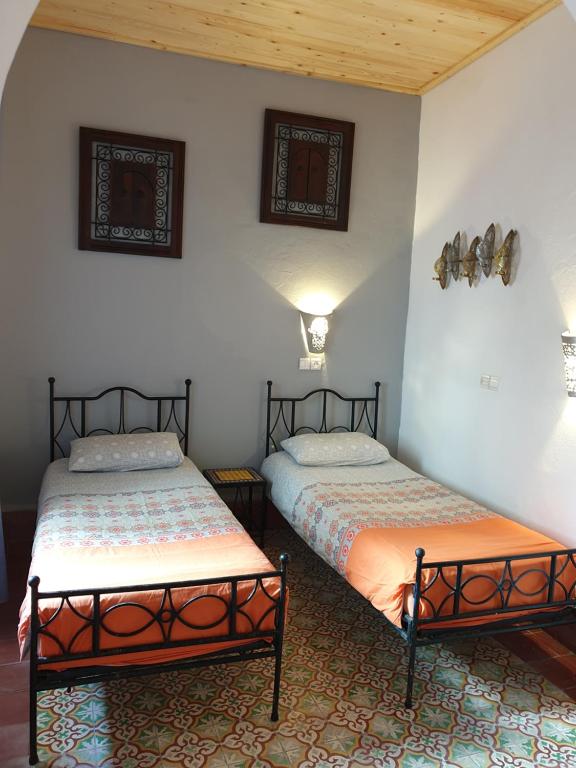 Postel nebo postele na pokoji v ubytování Riad Sidi Magdoul