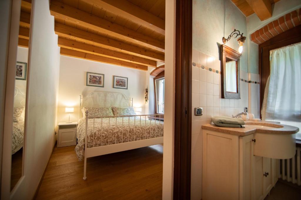 Postel nebo postele na pokoji v ubytování Villa Vitis