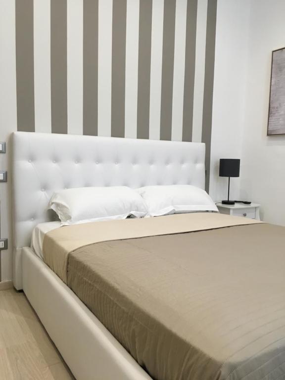 Postel nebo postele na pokoji v ubytování Maestrale Charme Rooms