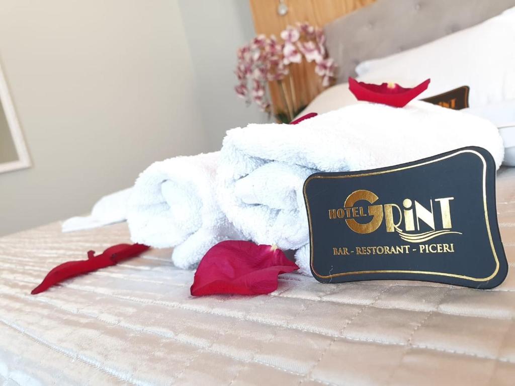 Postel nebo postele na pokoji v ubytování Hotel GRINT