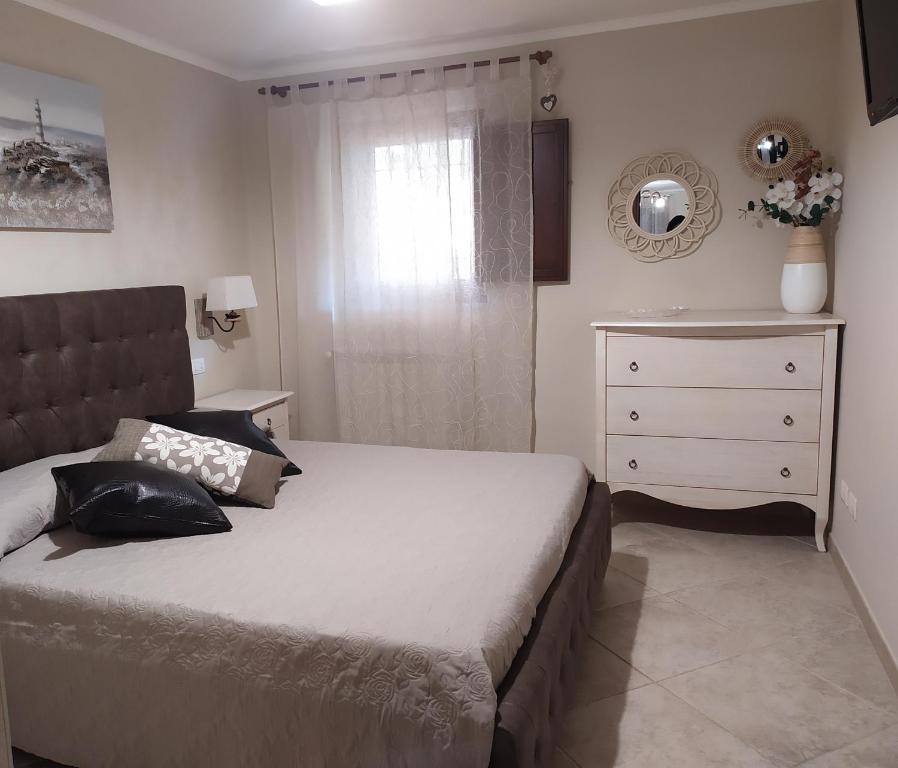 Posteľ alebo postele v izbe v ubytovaní Dimora Algano Apartment