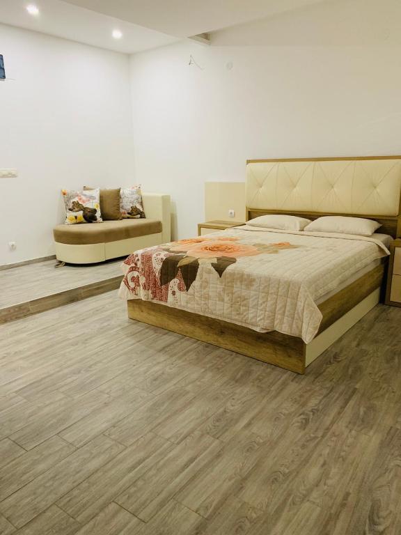 Postel nebo postele na pokoji v ubytování Seafront Apartments