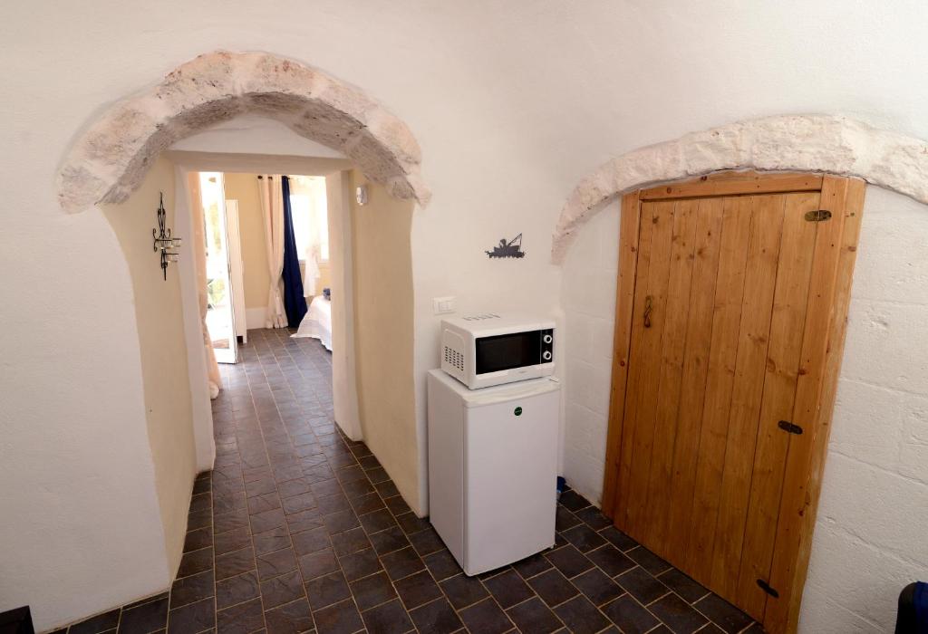 Kuchyň nebo kuchyňský kout v ubytování Trullo Vista