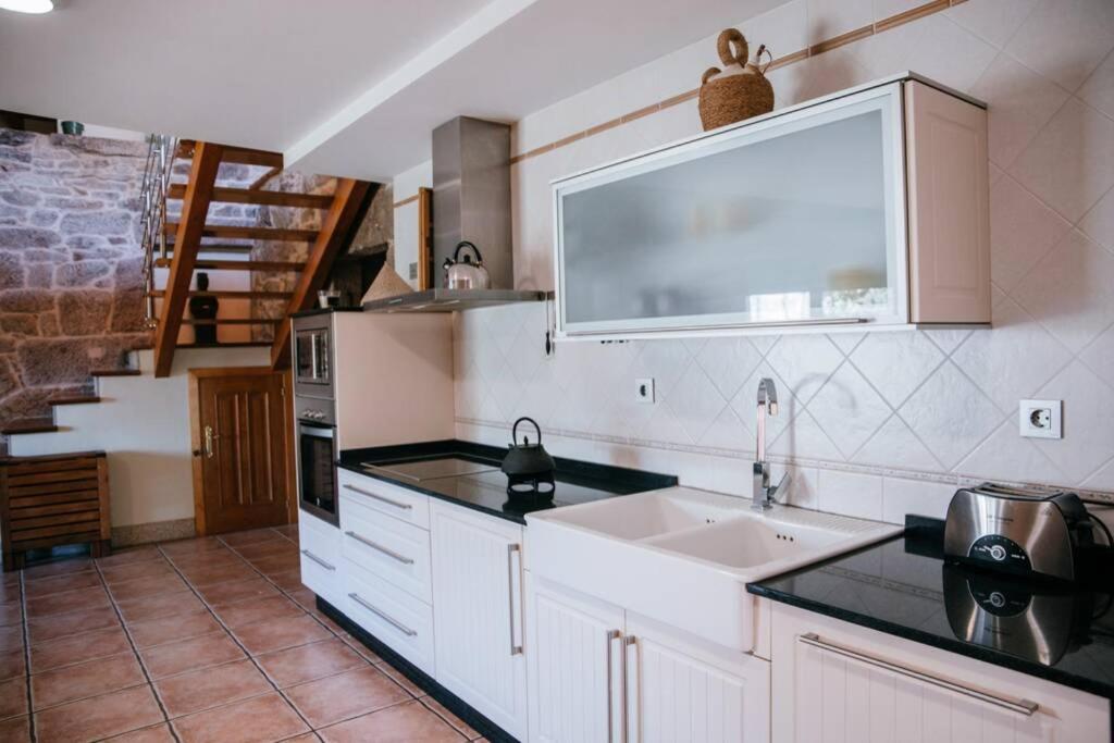 A kitchen or kitchenette at Casa de Vacaciones en Galicia de Karlos