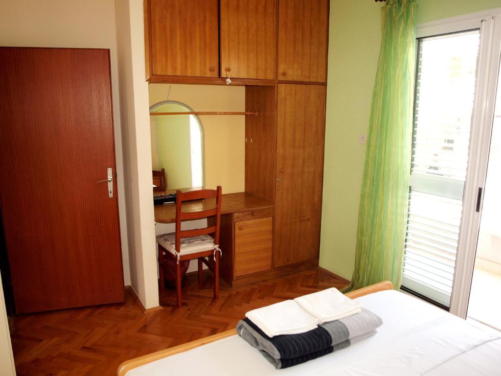 Posteľ alebo postele v izbe v ubytovaní Apartman Miljko Podgora