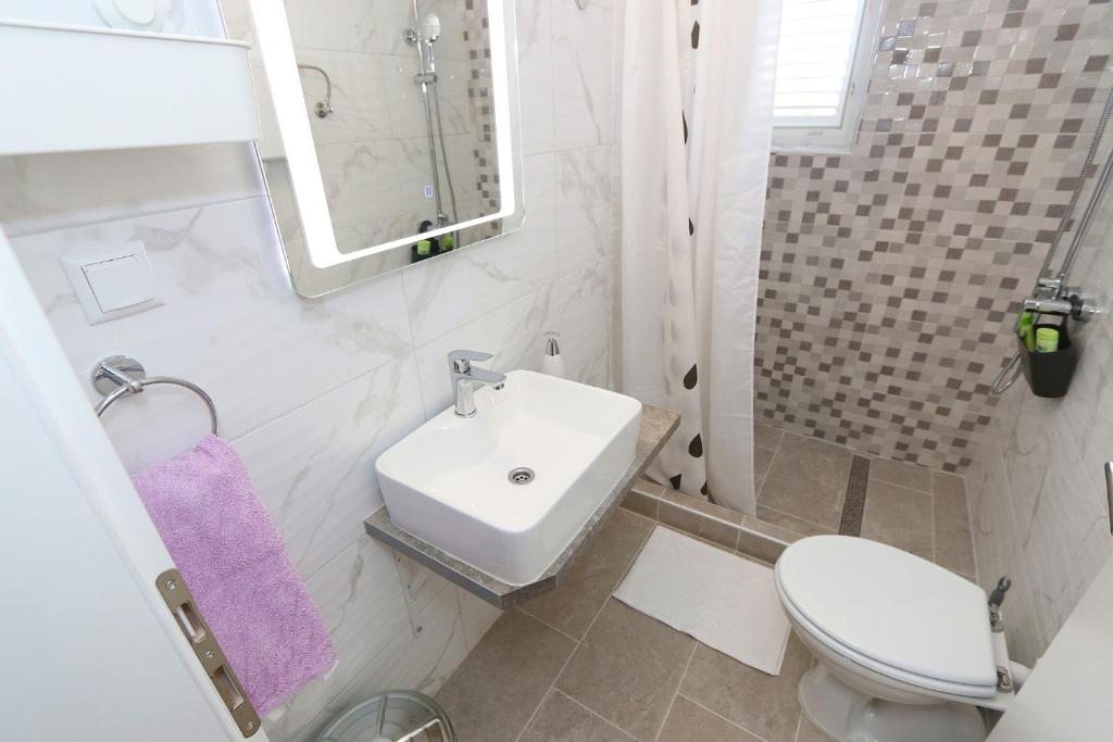 Koupelna v ubytování Rooms Bambina