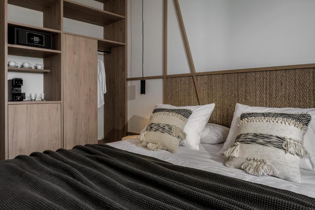 Letto o letti in una camera di Mon Repo Suites