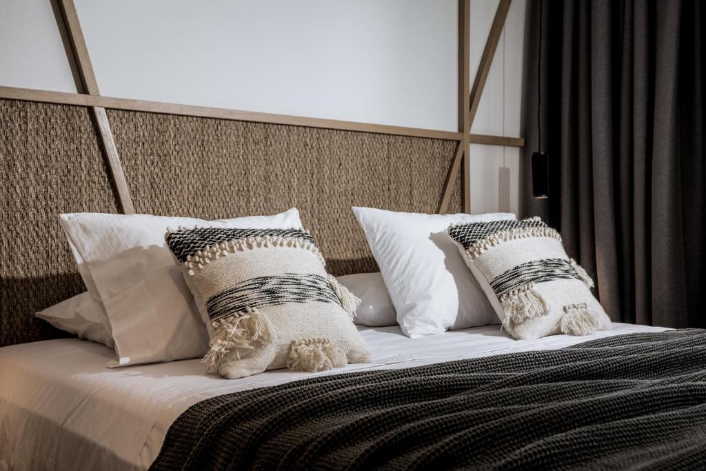 Letto o letti in una camera di Mon Repo Suites