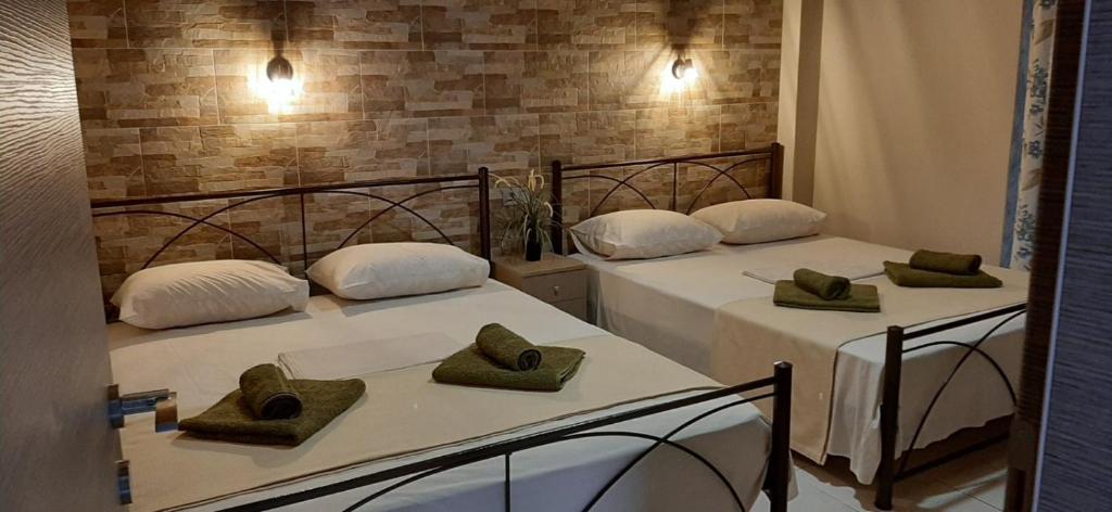 Postel nebo postele na pokoji v ubytování SEA VIEW APARTMENTS Artemis