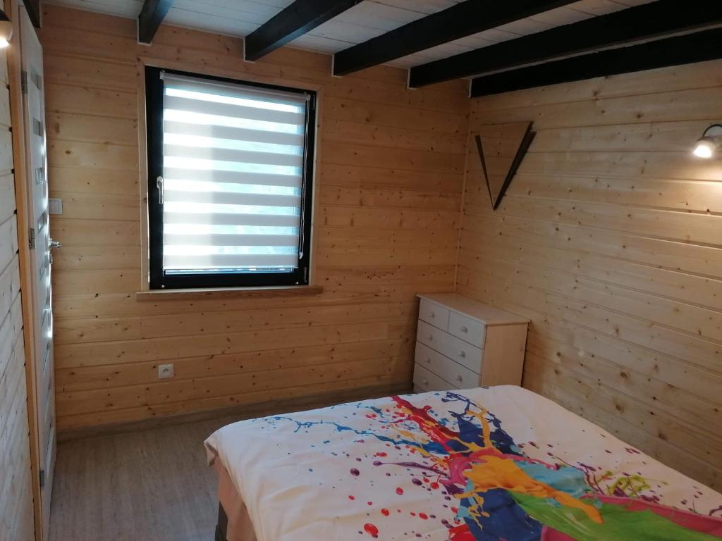 Postel nebo postele na pokoji v ubytování Domek u Beaty