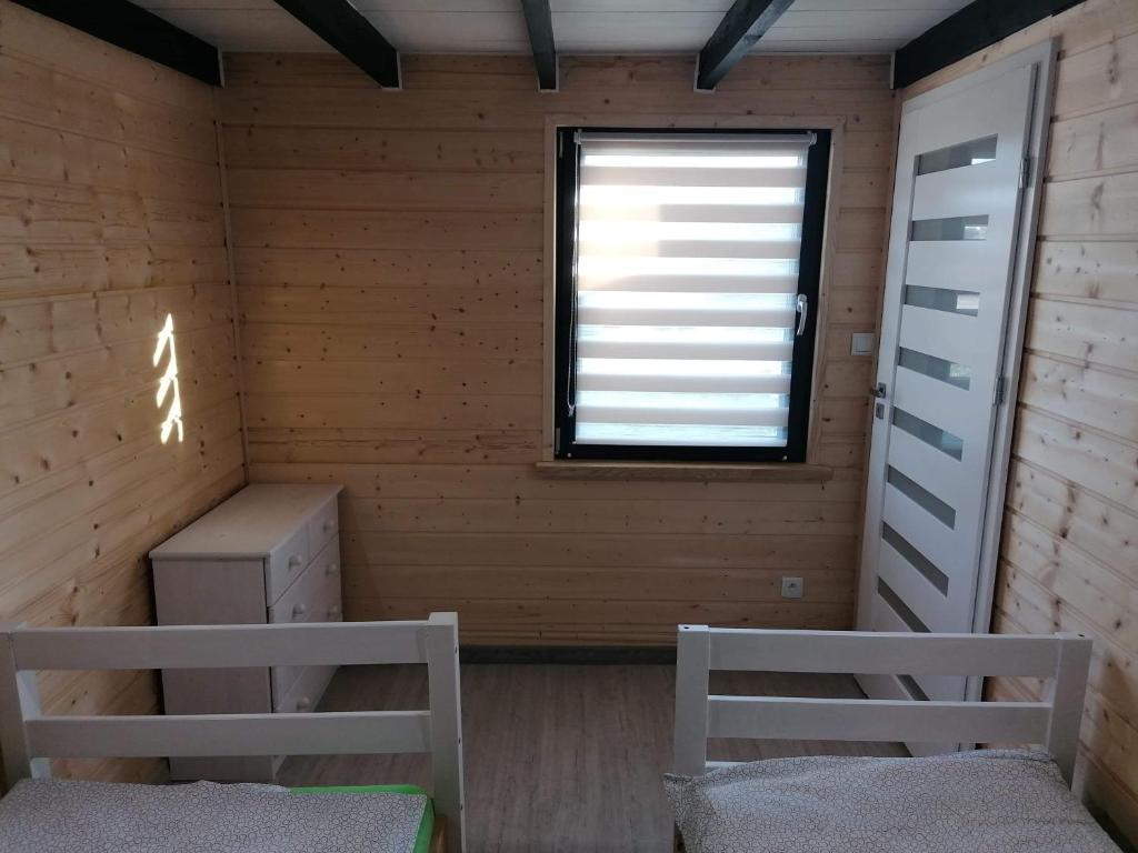 Postel nebo postele na pokoji v ubytování Domek u Beaty