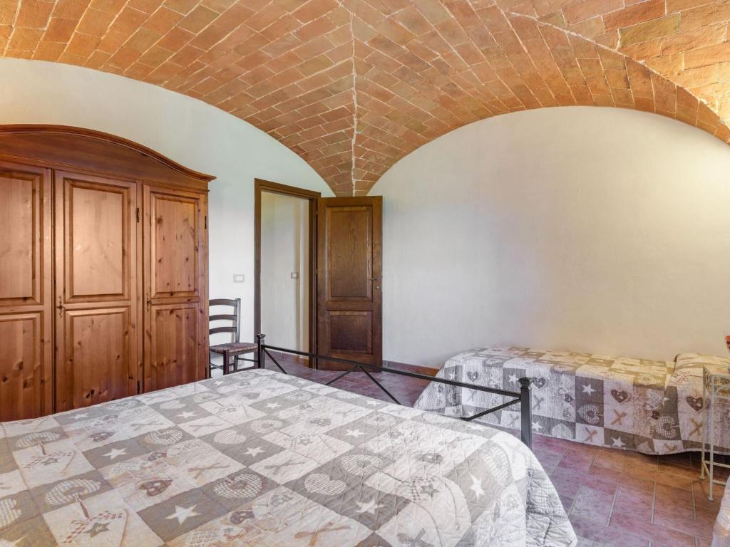 Posteľ alebo postele v izbe v ubytovaní Holiday home in Volterra with pool