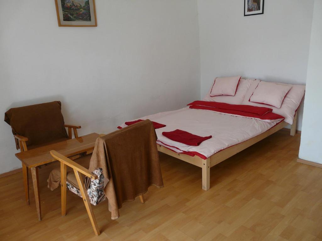 Łóżko lub łóżka w pokoju w obiekcie Mi-Ri Balance vendégház