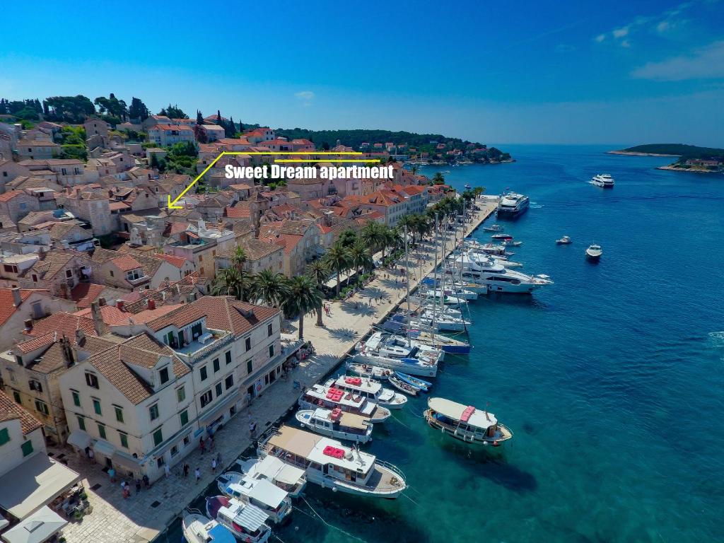 an aerial view of a harbor with boats in the water at Sweet Dreams Old Town Hvar in Hvar