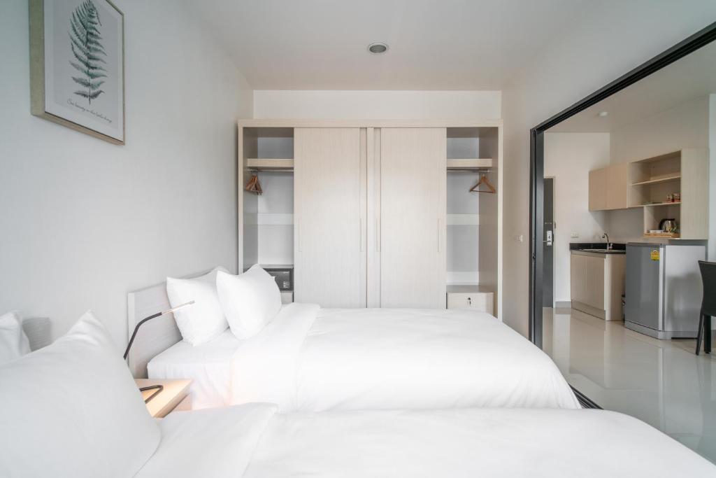 KOS Hotel Suvarnabhumi Airport -SHA Extra Plus - Superior Tweepersoonskamer Met 2 Aparte Bedden
