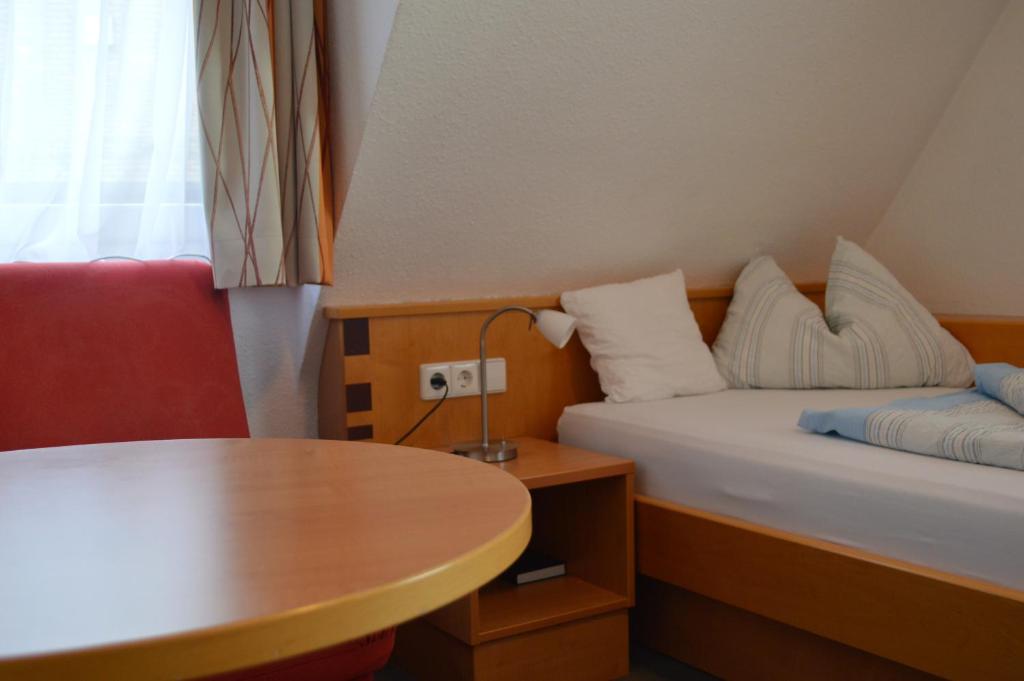 Postel nebo postele na pokoji v ubytování BB City Hotel