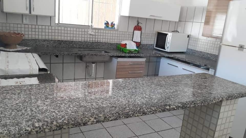  CASA COM SAUNA e PISCINA NO CENTRO