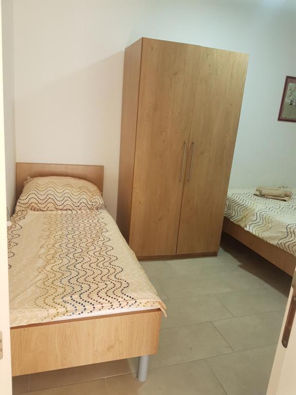 Postel nebo postele na pokoji v ubytování Villa Niva