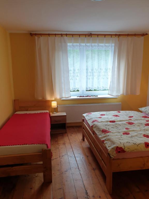 Postel nebo postele na pokoji v ubytování Chalupa Anna
