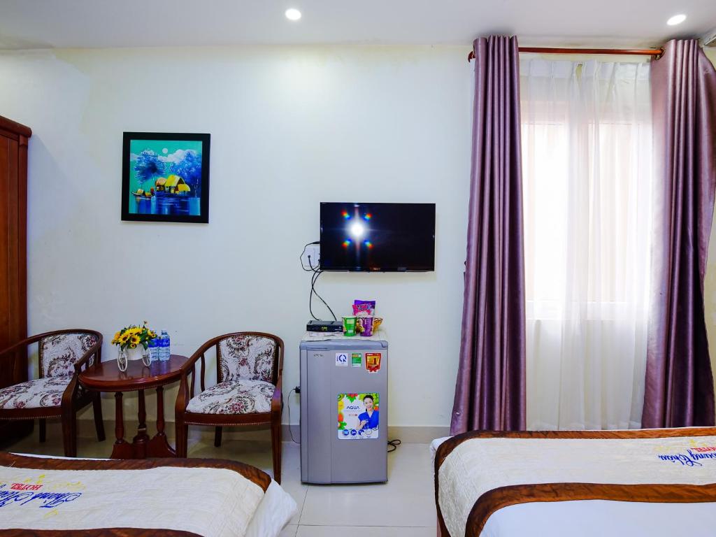 TV a/nebo společenská místnost v ubytování Thành Hoàng Châu Boutique Hotel
