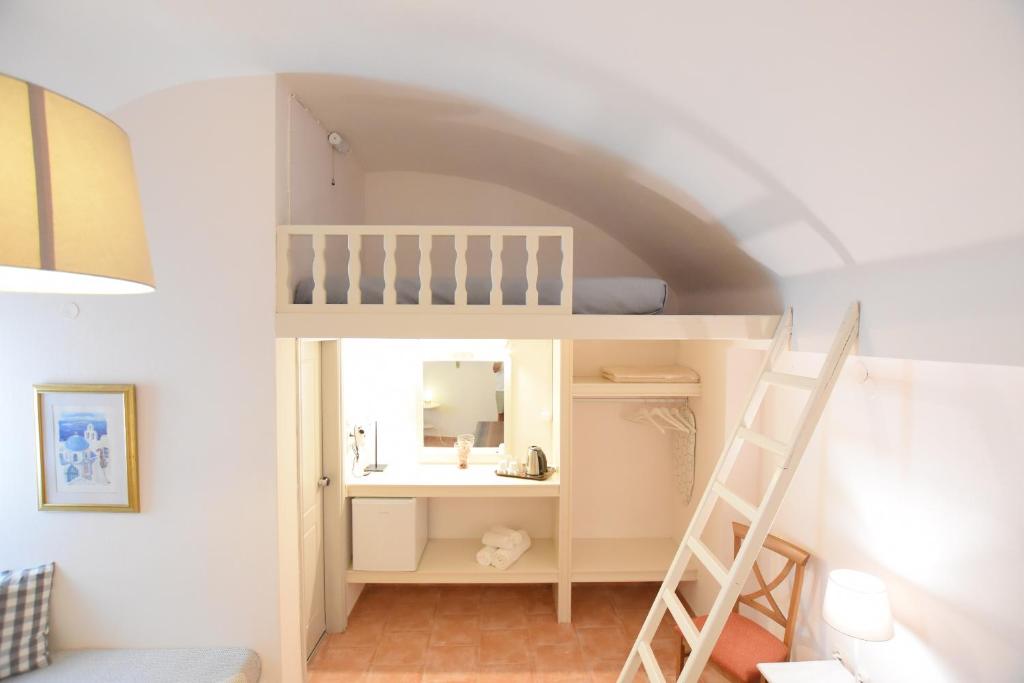 Postel nebo postele na pokoji v ubytování Rodakas Hotel
