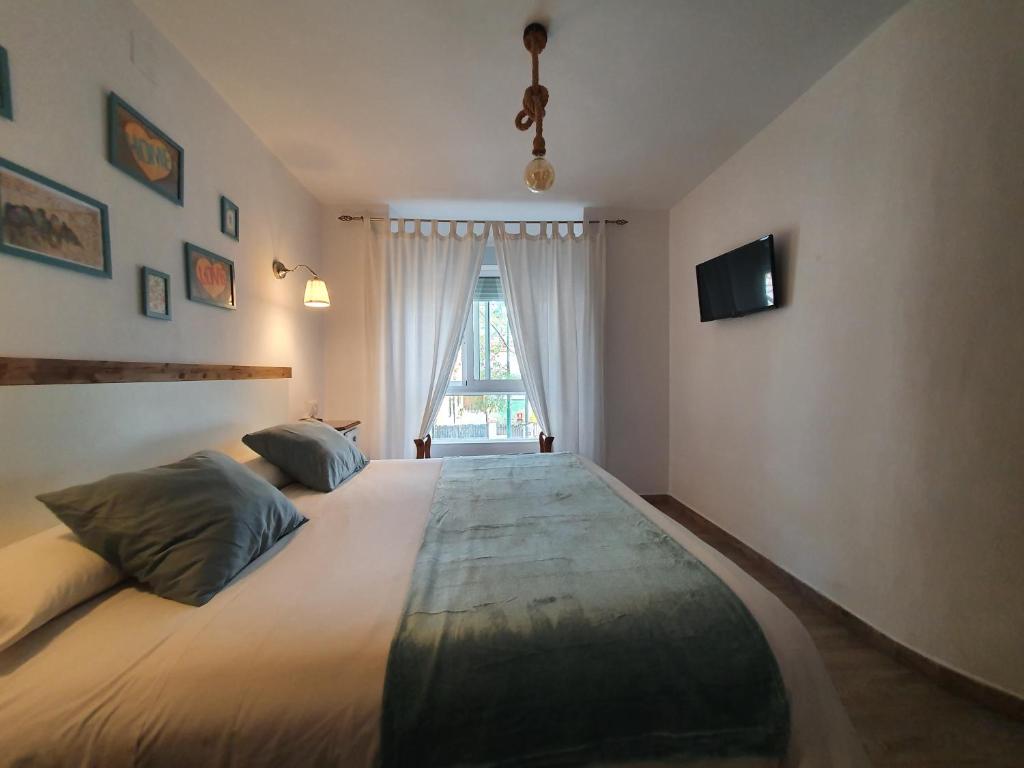 Posteľ alebo postele v izbe v ubytovaní El Nogal Home