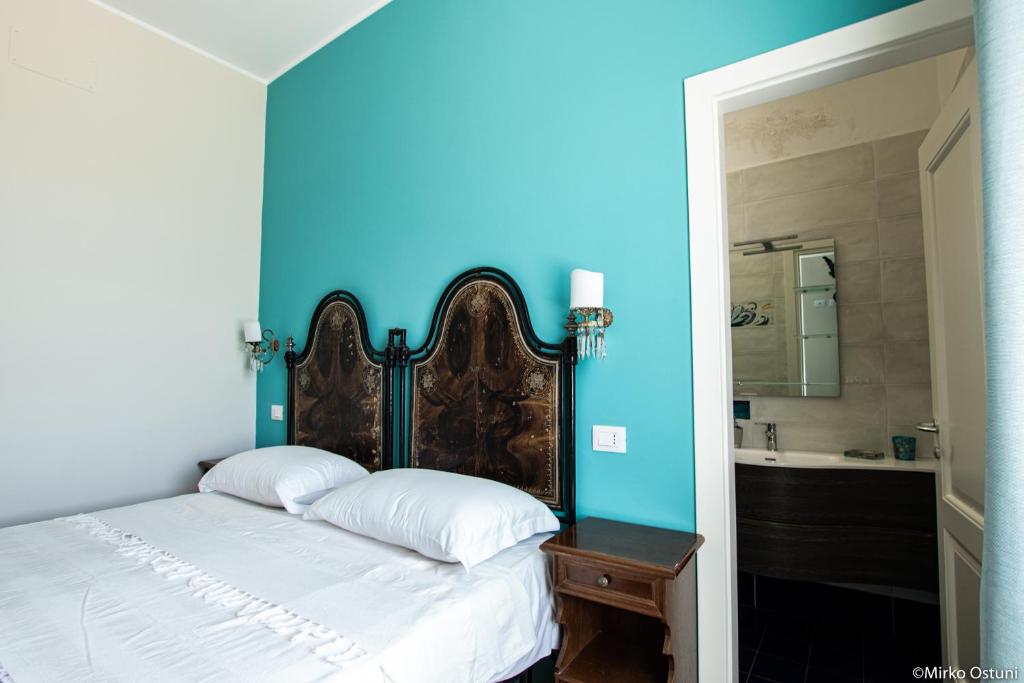 En eller flere senge i et værelse på Villa Incina - Sea House