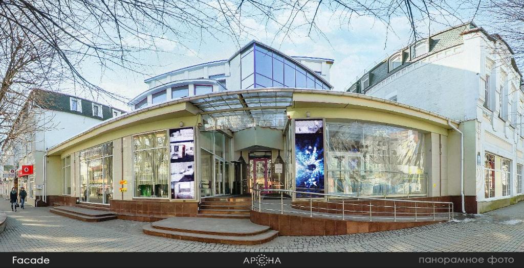 a store front of a building on a street at Arena in Khmelnytskyi