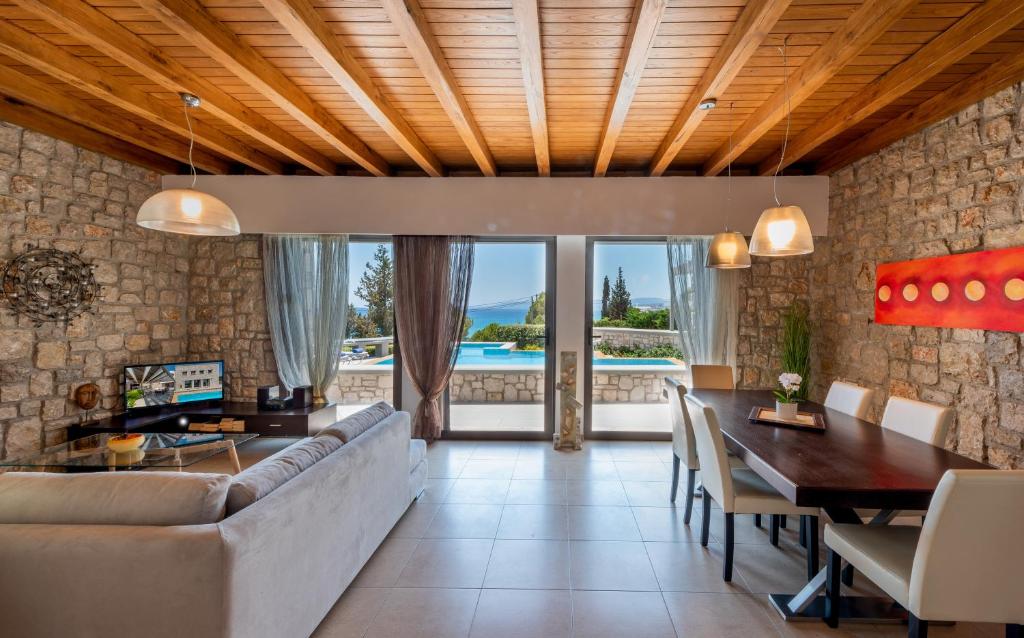 A seating area at Villa CostaMare - enjoy lazy days on the private Pool-Jacuzzi