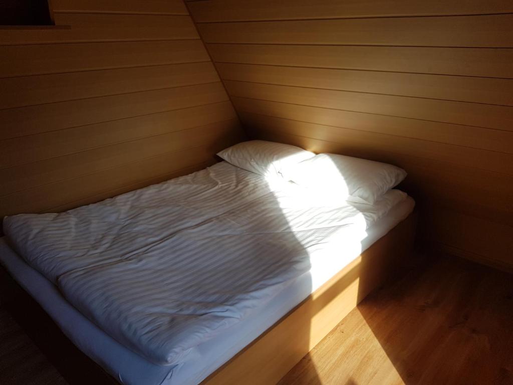 Postel nebo postele na pokoji v ubytování CIME Ekonomik