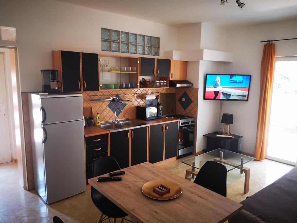 Kuchyň nebo kuchyňský kout v ubytování Casa Chiara