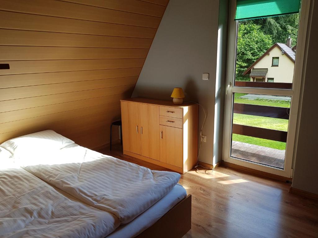 Postel nebo postele na pokoji v ubytování CIME Ekonomik