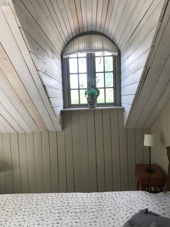 Postel nebo postele na pokoji v ubytování Arphus Lodge
