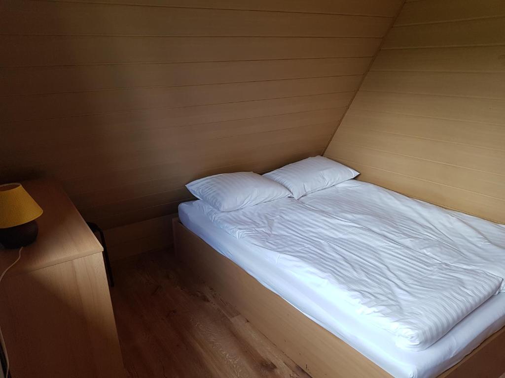 Postel nebo postele na pokoji v ubytování CIME Ekonomik