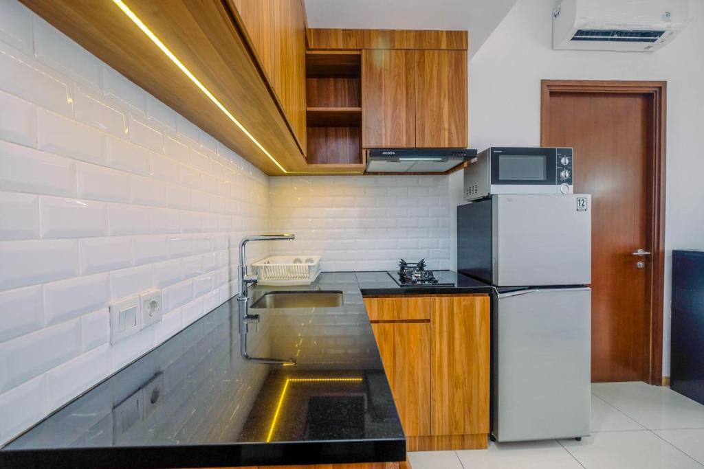 Brand New 1BR Apartment at M-Town Signature By Travelio - 一卧室公寓