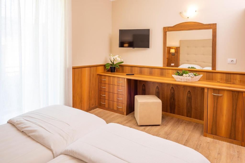 TV a/nebo společenská místnost v ubytování Hotel Centrale