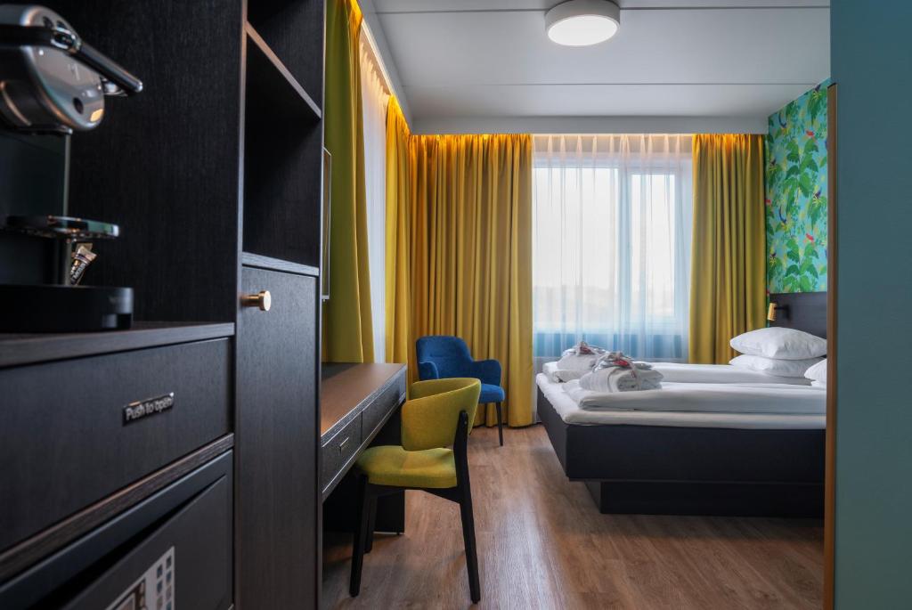 Postel nebo postele na pokoji v ubytování Thon Hotel Alta