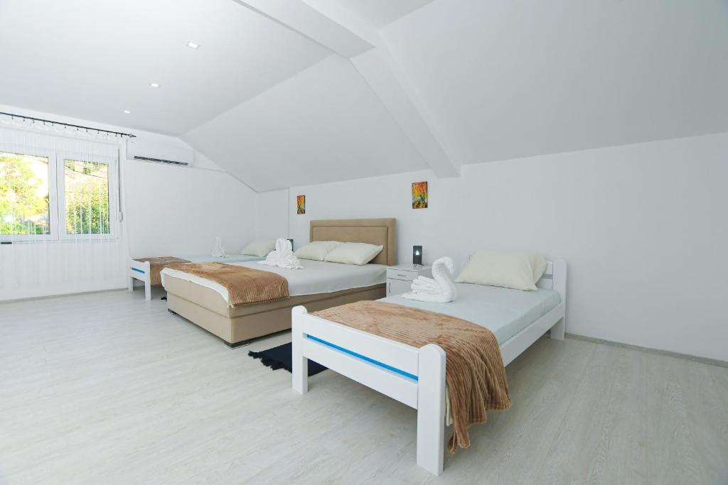 Postel nebo postele na pokoji v ubytování Mokka House